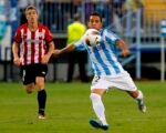 Santi Cazorla en un partido en La Rosaleda. Málaga CF